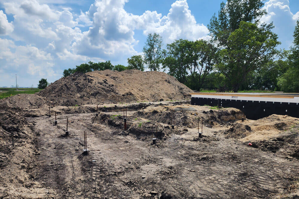 A-Built Construction Screw Piles on Job Site